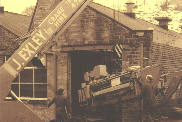 old photo of machine moving